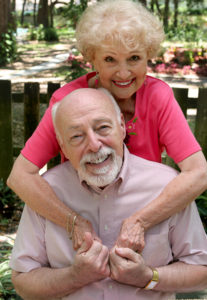 a happy senior man and woman